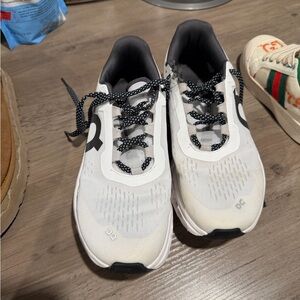 On Running Women's Black and White Sneakers